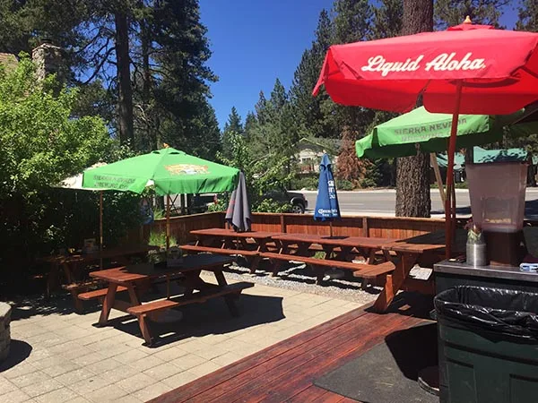 Umbrellas and picnic tables among the Tahoe pines