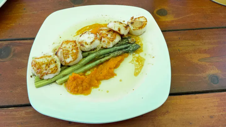 Seared scallops with asparagus and a citrus puree