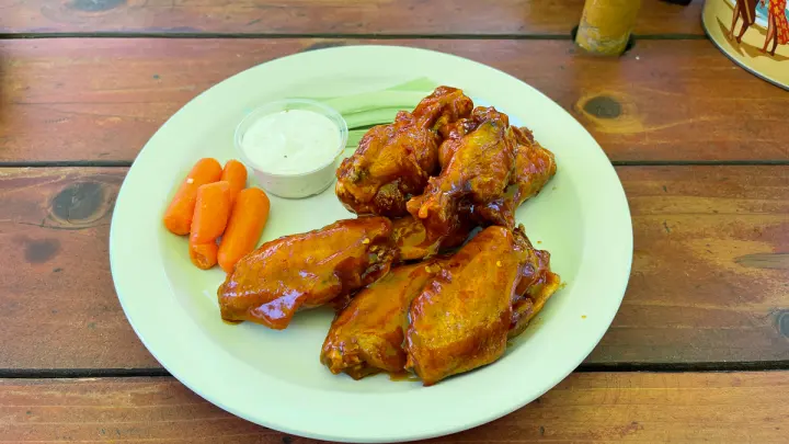 BBQ chicken wings served with house made ranch and carrots